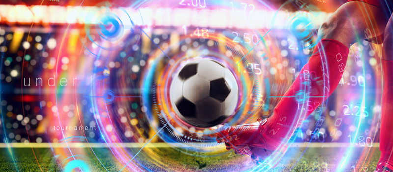 Jogador chutando bola de futebol com espirais coloridos ao redor